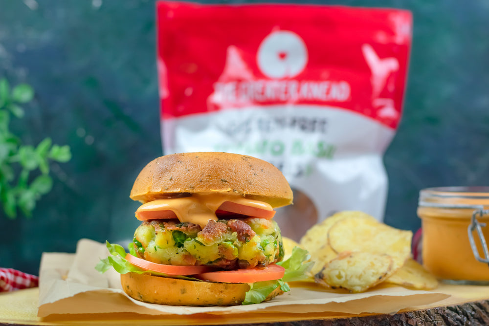 gluten free veggie burger on bagel with chipotle sauce
